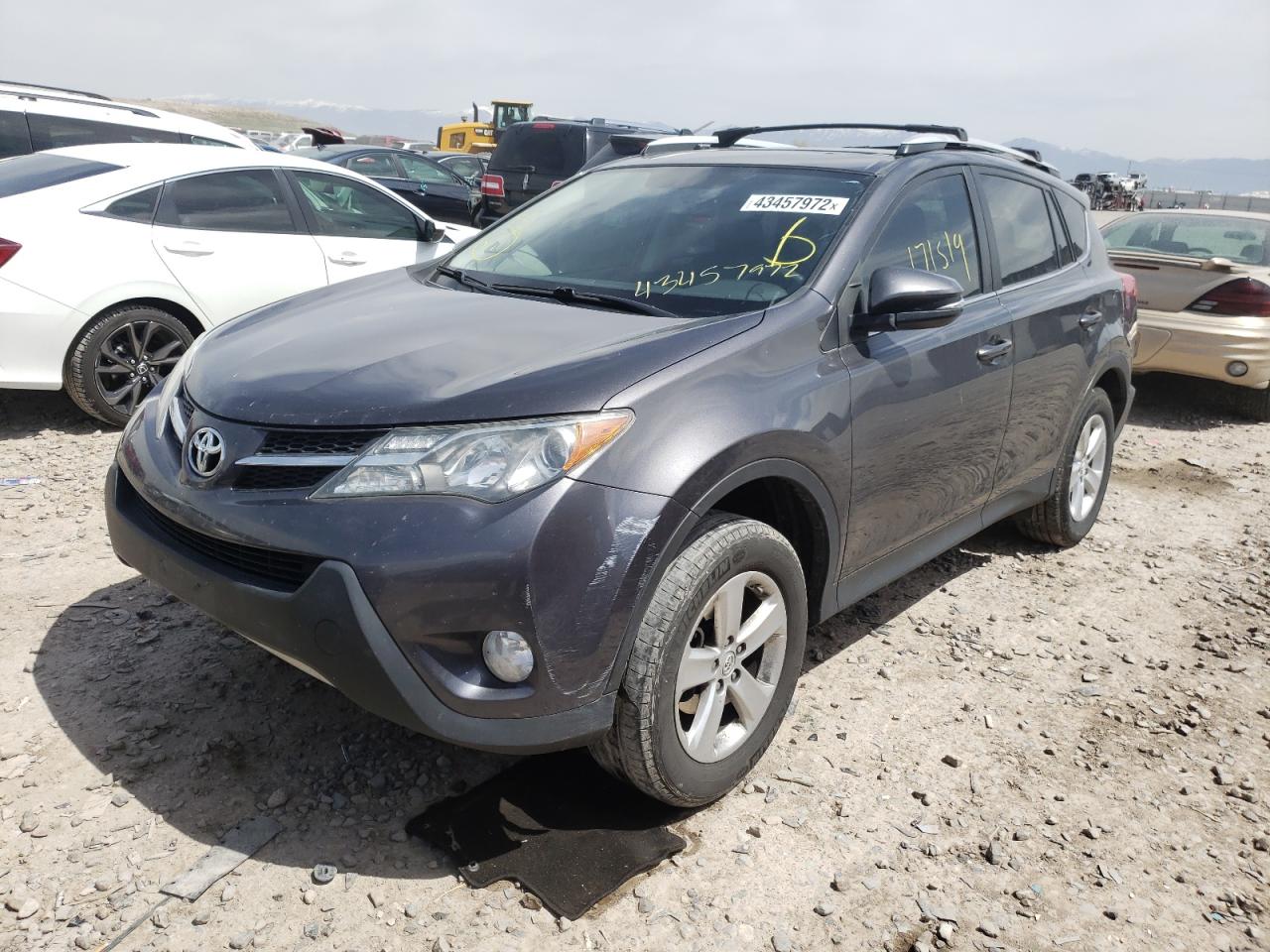 Photo 2 from auction – 2014 TOYOTA RAV4 XLE with VIN JTMWFREV9EJ011470