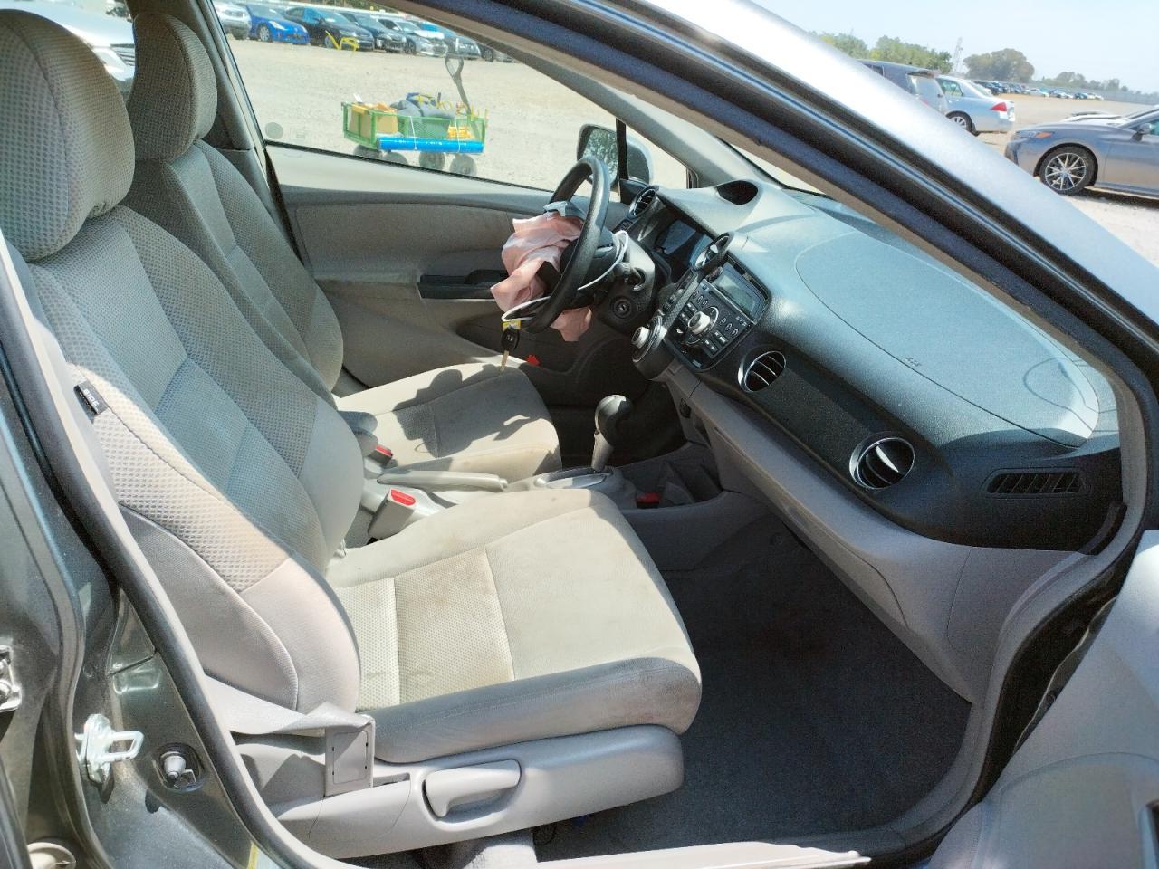 Photo 5 from auction – 2011 HONDA INSIGHT LX with VIN JHMZE2H56BS002586