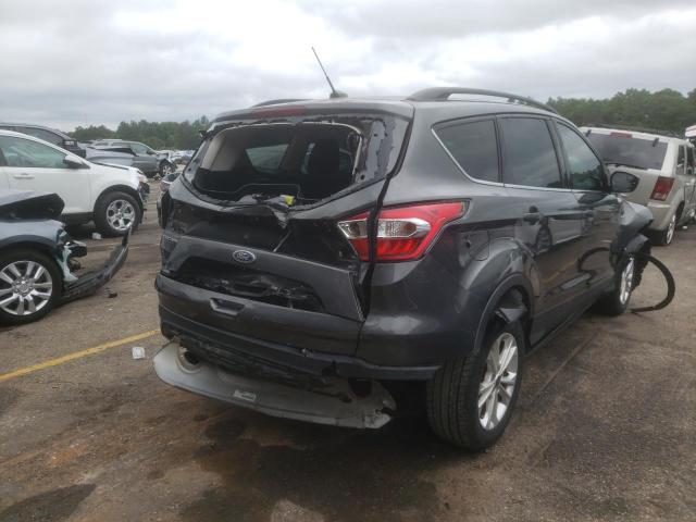 Photo 4 from auction – 2018 FORD ESCAPE SE with VIN 1FMCU9G94JUC38627