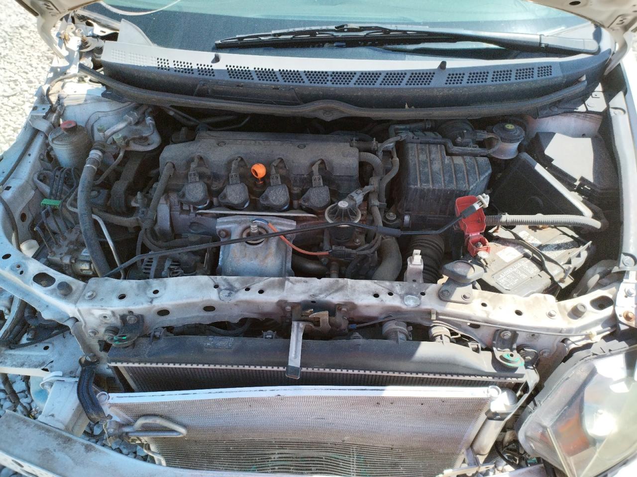 Photo 12 from auction – 2011 HONDA CIVIC LX with VIN 19XFA1F57BE032504