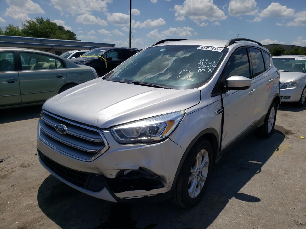 Photo 2 from auction – 2017 FORD ESCAPE SE with VIN 1FMCU0GD9HUC73156