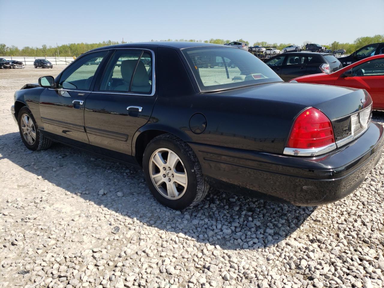Photo 3 from auction – 2011 FORD CROWN VICT with VIN 2FABP7EV9BX174869