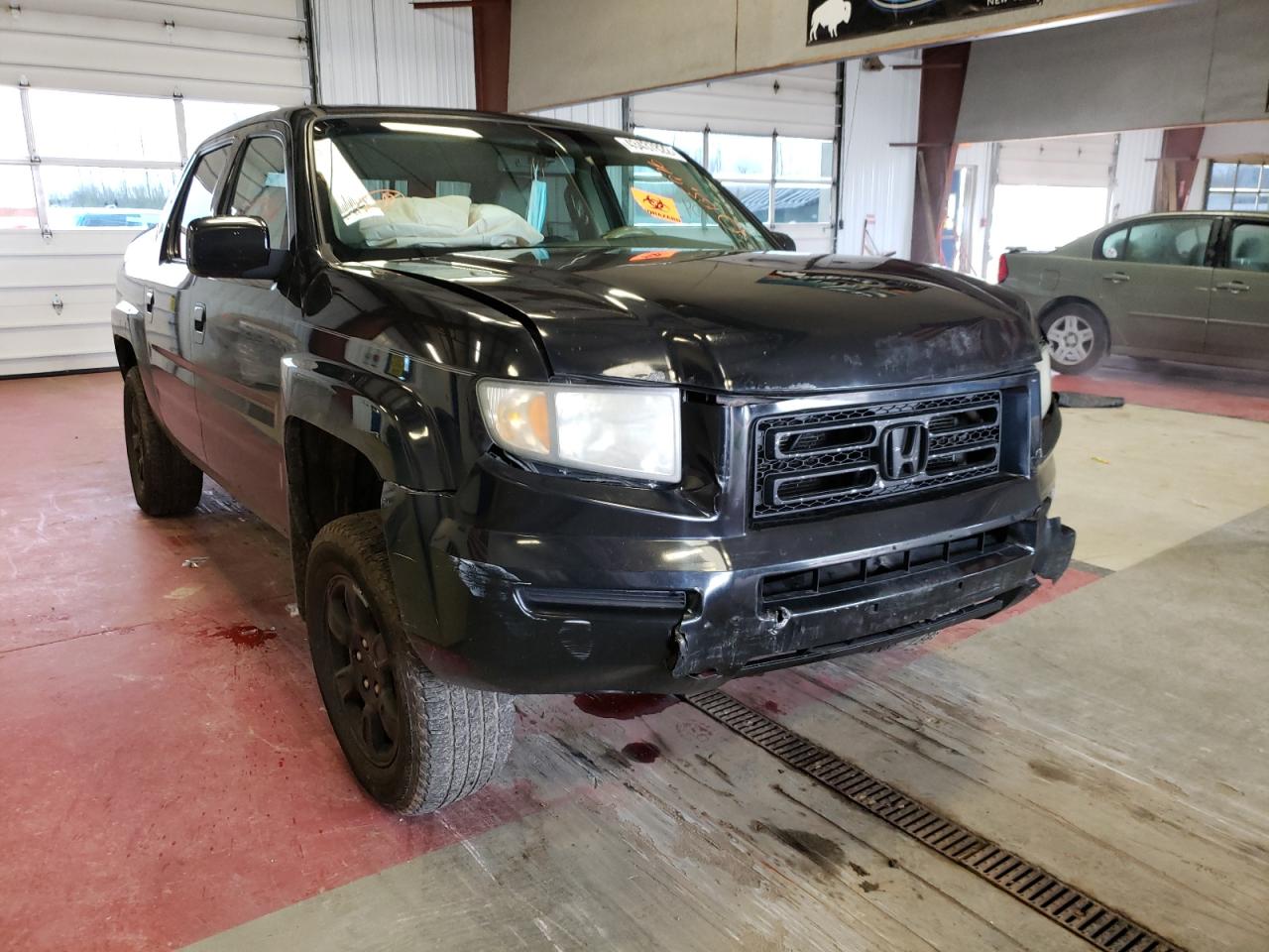 HONDA RIDGELINE 2006 with VIN 2HJYK16506H545783 - Photo from auction