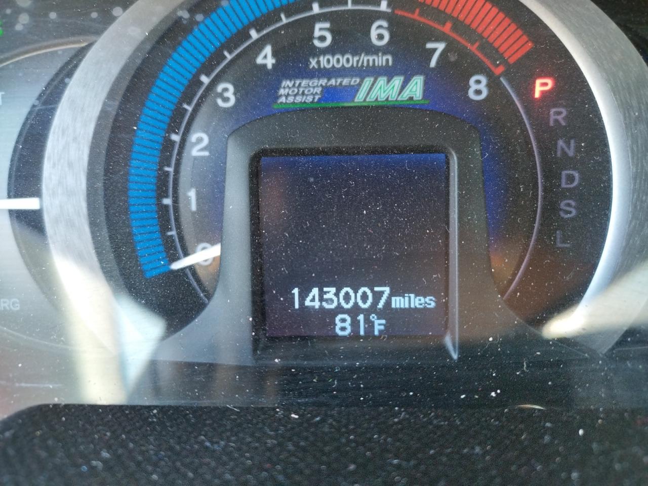 Photo 8 from auction – 2011 HONDA INSIGHT LX with VIN JHMZE2H56BS002586