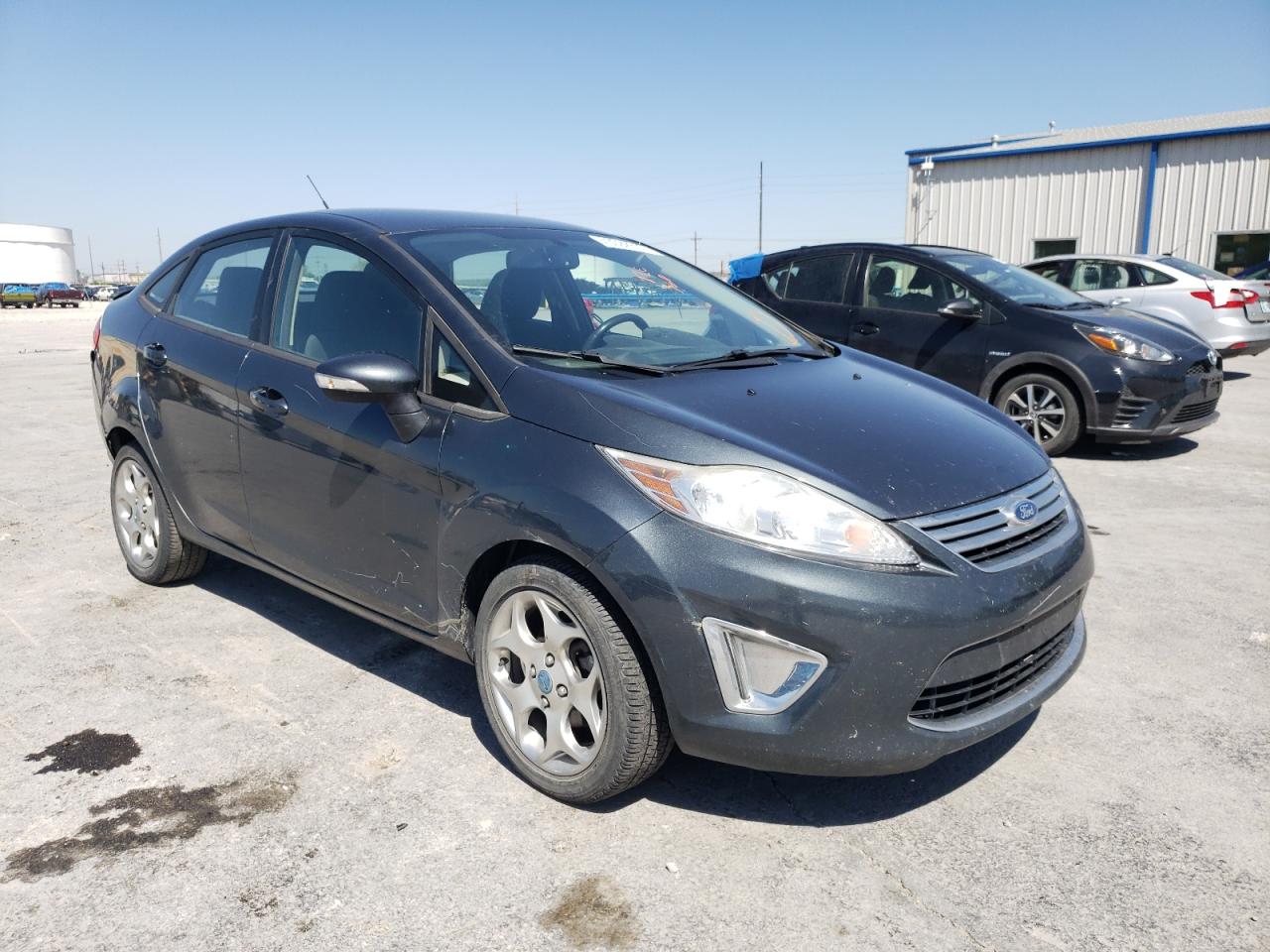 FORD FIESTA SEL 2011 with VIN 3FADP4CJ6BM217292 - Photo from auction