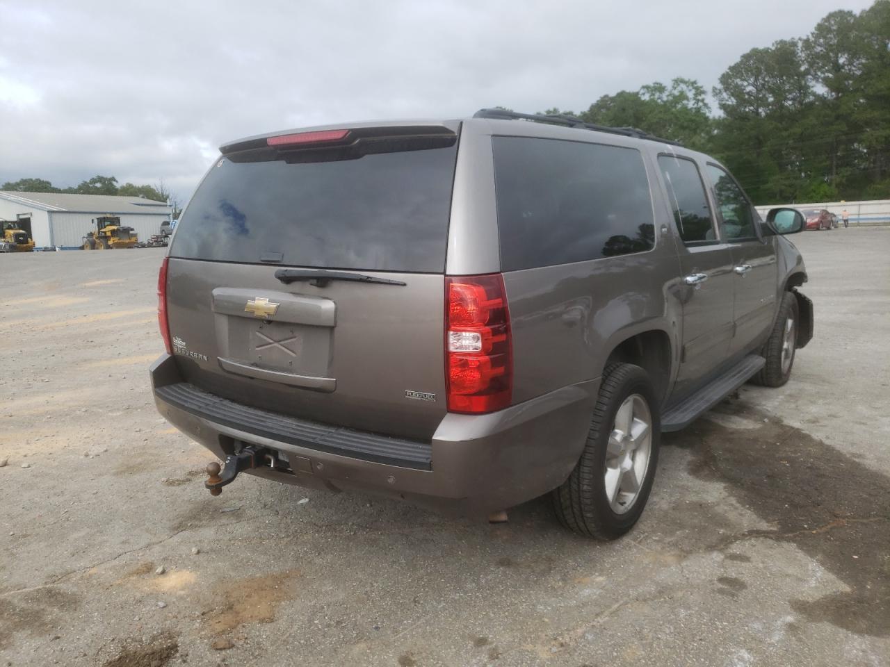 Photo 4 from auction – 2011 CHEVROLET SUBURBAN C with VIN 1GNSCJE01BR327561