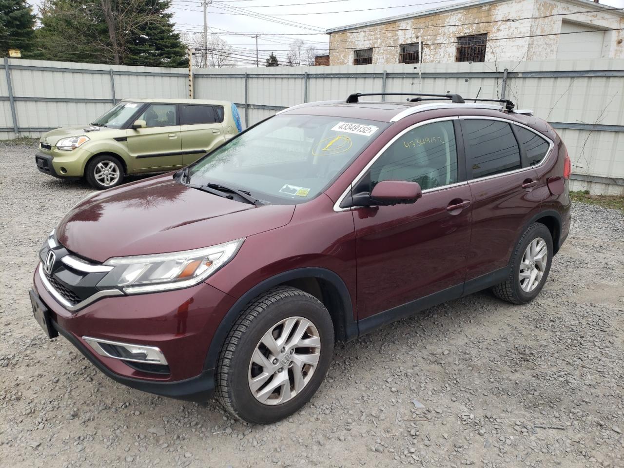 Photo 2 from auction – 2015 HONDA CR-V EXL with VIN 2HKRM4H74FH603856
