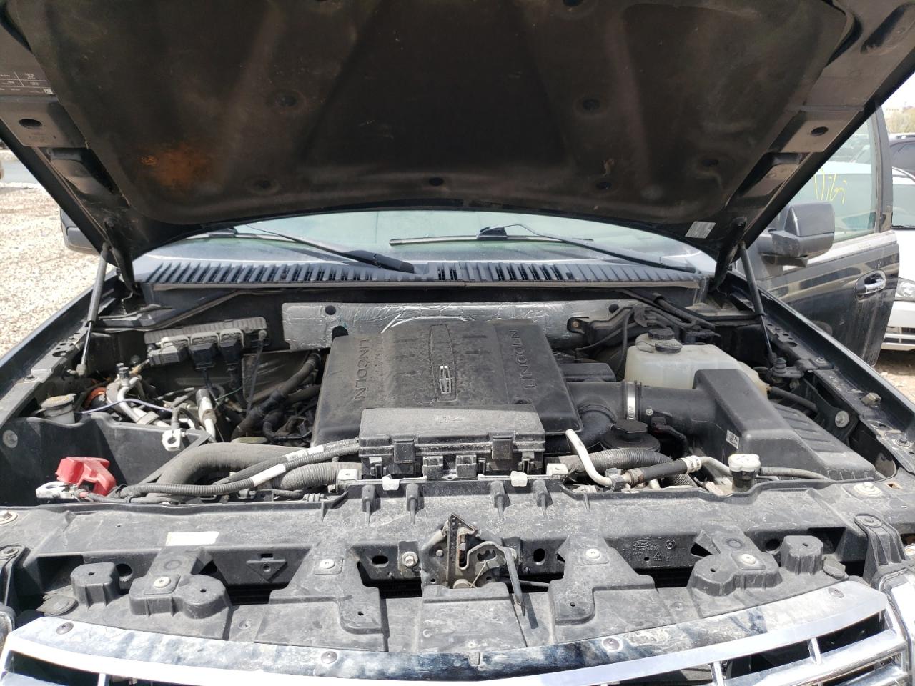 Photo 7 from auction – 2014 LINCOLN NAVIGATOR with VIN 5LMJJ2J51EEL02911