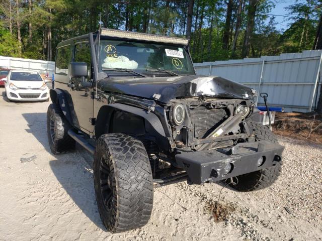 JEEP WRANGLER S 2015 with VIN 1C4AJWAG0FL766348 - Photo from auction