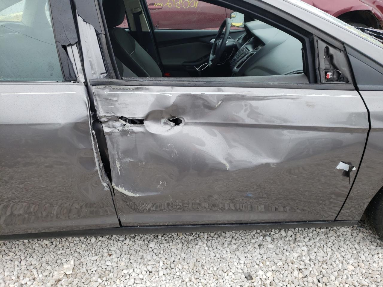 Photo 9 from auction – 2013 FORD FOCUS SE with VIN 1FADP3F22DL182155