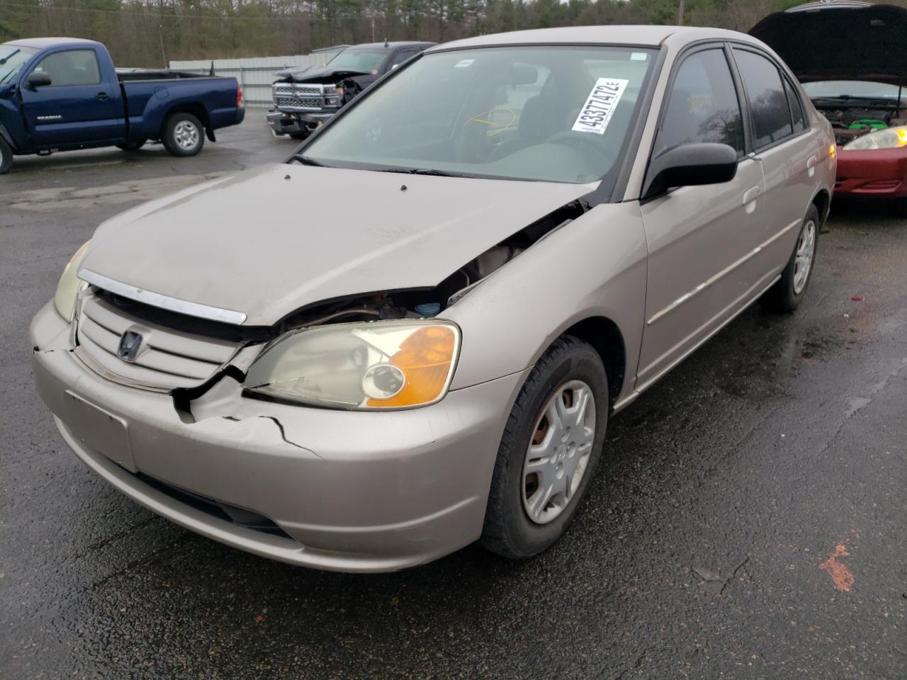 Photo 2 from auction – 2002 HONDA CIVIC LX with VIN 1HGES16502L033740