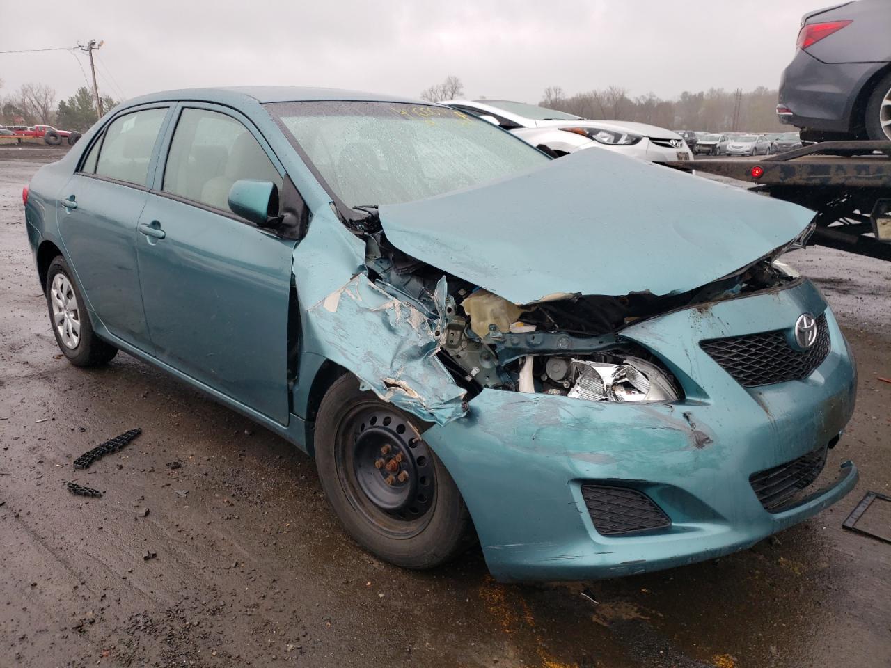 TOYOTA COROLLA 2010 with VIN 2T1BU4EE8AC418967 - Photo from auction