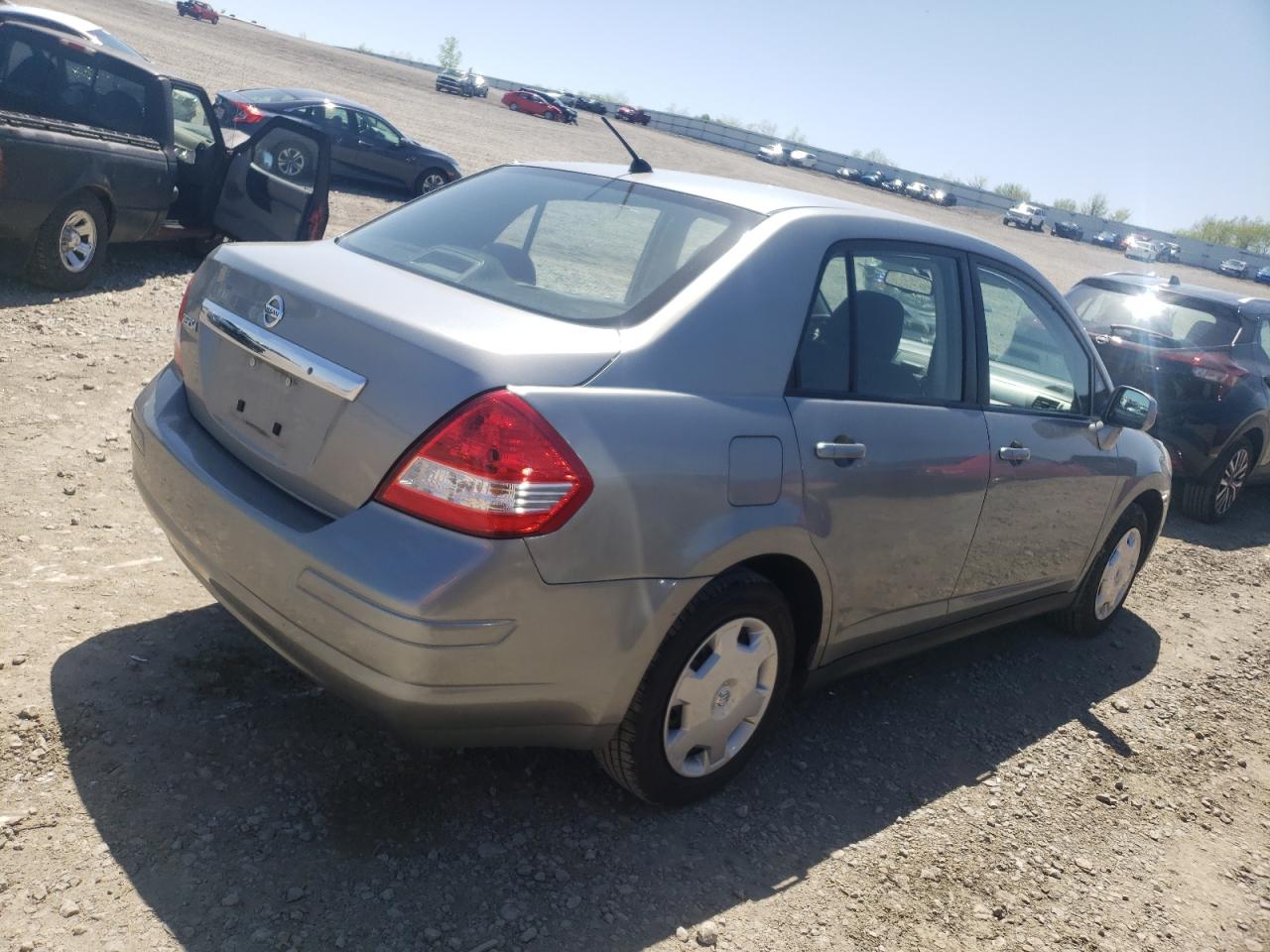 Photo 4 from auction – 2009 NISSAN VERSA S with VIN 3N1BC11E09L499319