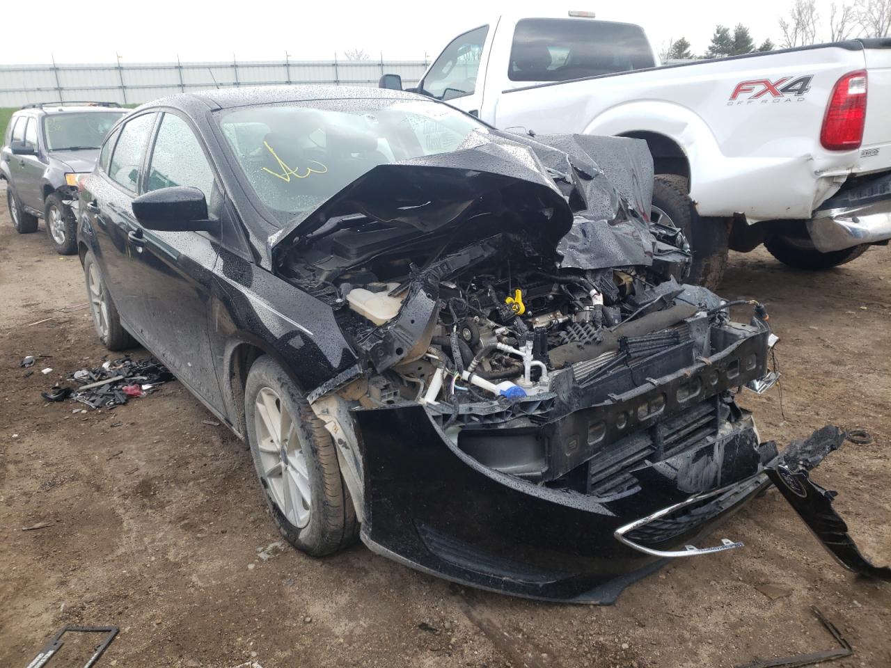 FORD FOCUS SE 2018 with VIN 1FADP3K27JL292586 - Photo from auction