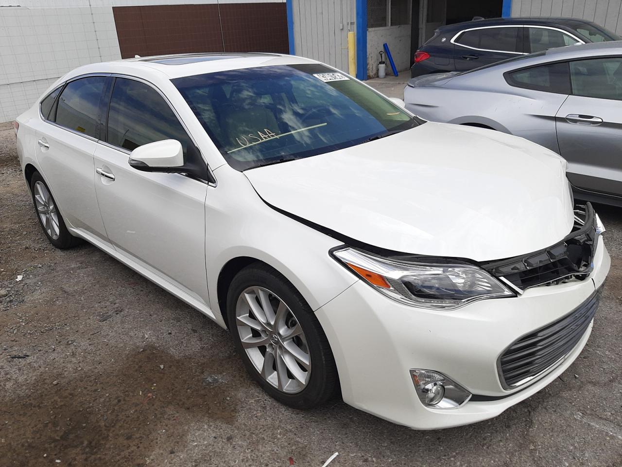 TOYOTA AVALON XLE 2015 with VIN 4T1BK1EB5FU178485 - Photo from auction