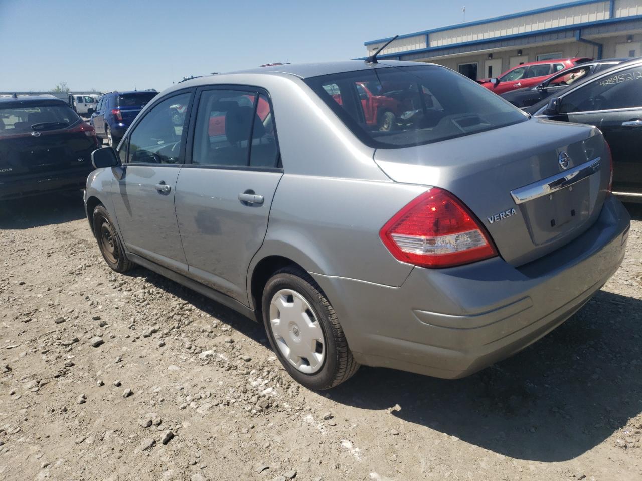 Photo 3 from auction – 2009 NISSAN VERSA S with VIN 3N1BC11E09L499319