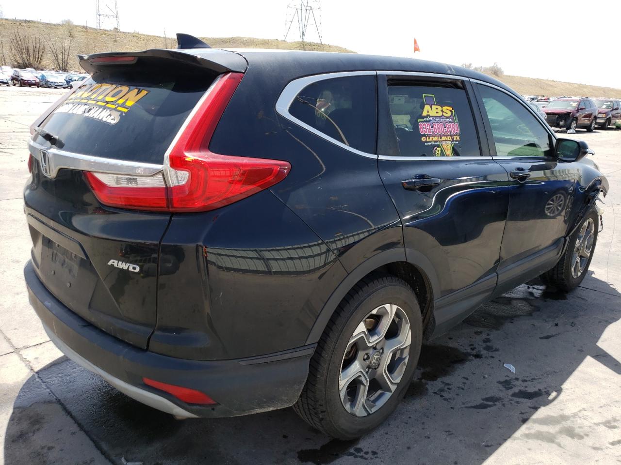 Photo 4 from auction – 2017 HONDA CR-V EXL with VIN 2HKRW2H83HH657272