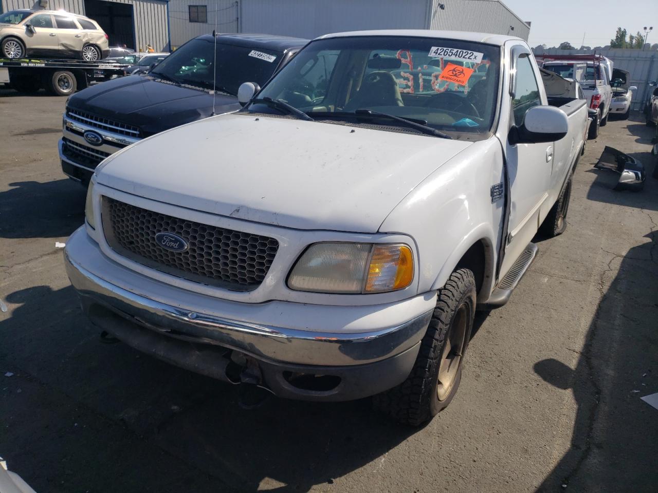 Photo 2 from auction – 2002 FORD F150 with VIN 1FTRF18L22NB99746