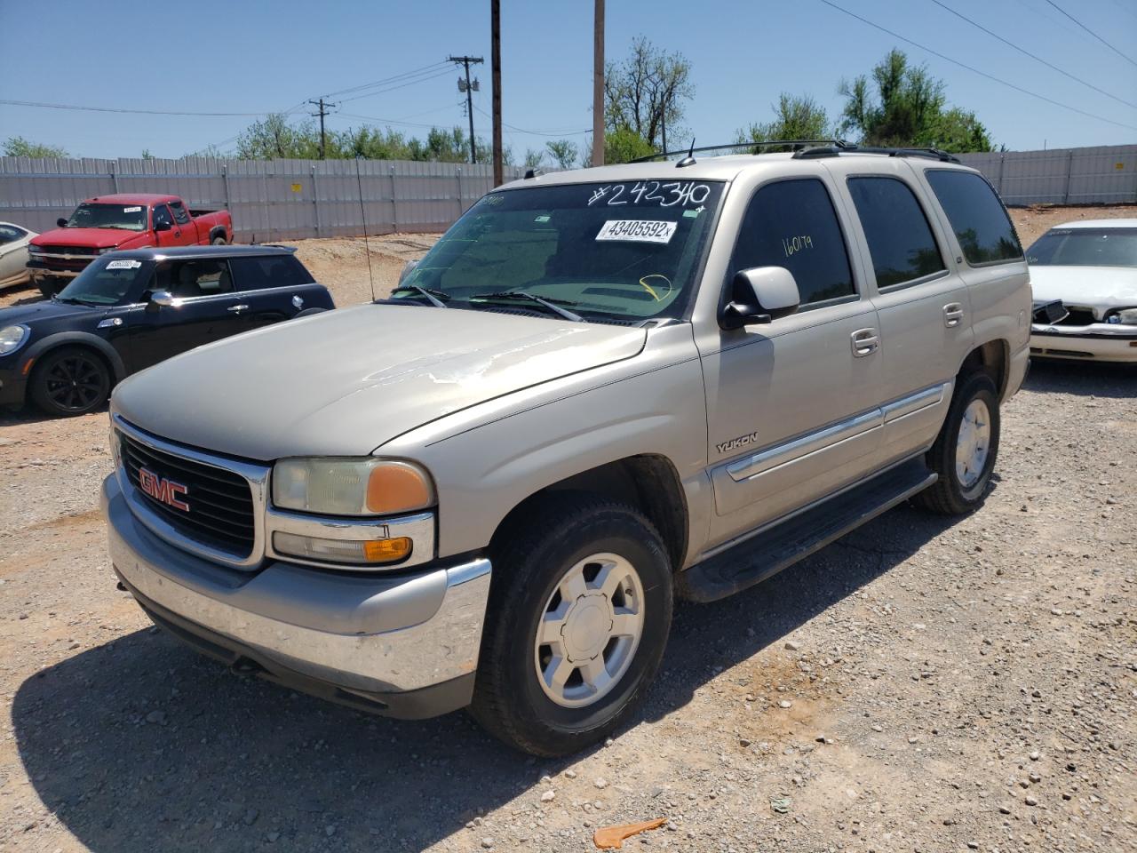 Photo 2 from auction – 2004 GMC YUKON with VIN 1GKEC13Z04R242340