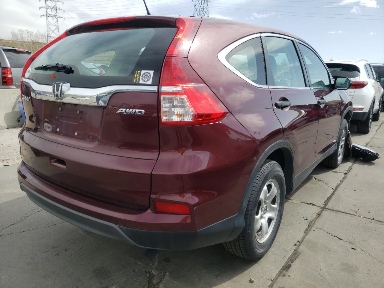 Photo 4 from auction – 2015 HONDA CR-V LX with VIN 2HKRM4H3XFH613482