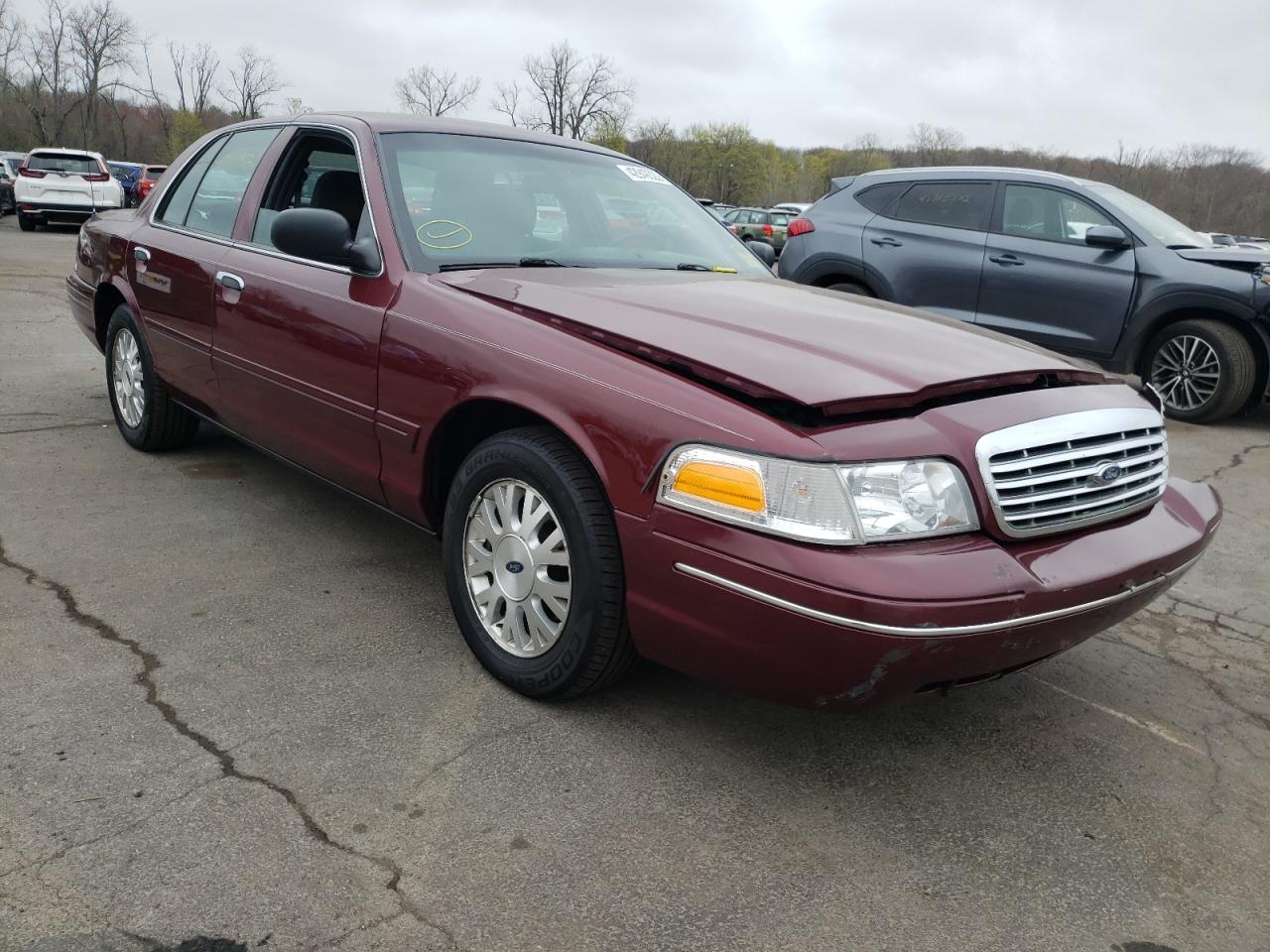 Photo 11 from auction – 2005 FORD CROWN VICT with VIN 2FAFP74W15X115878
