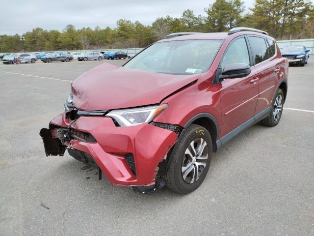 Photo 2 from auction – 2018 TOYOTA RAV4 LE with VIN 2T3BFREV7JW743963