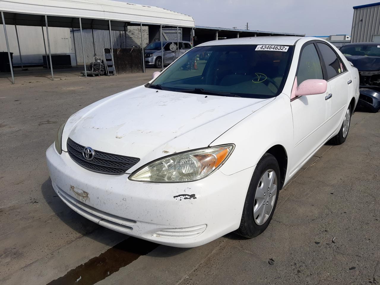 Photo 2 from auction – 2002 TOYOTA CAMRY LE with VIN JTDBE32K520070574