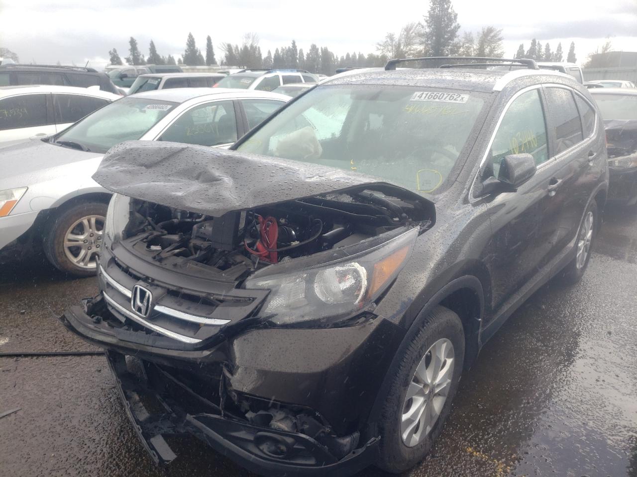 Photo 2 from auction – 2014 HONDA CR-V EXL with VIN 5J6RM4H72EL040164