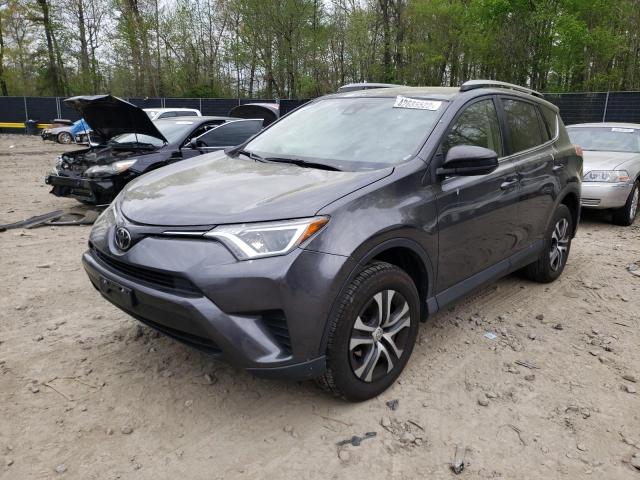 Photo 2 from auction – 2017 TOYOTA RAV4 LE with VIN JTMZFREV0HJ112818