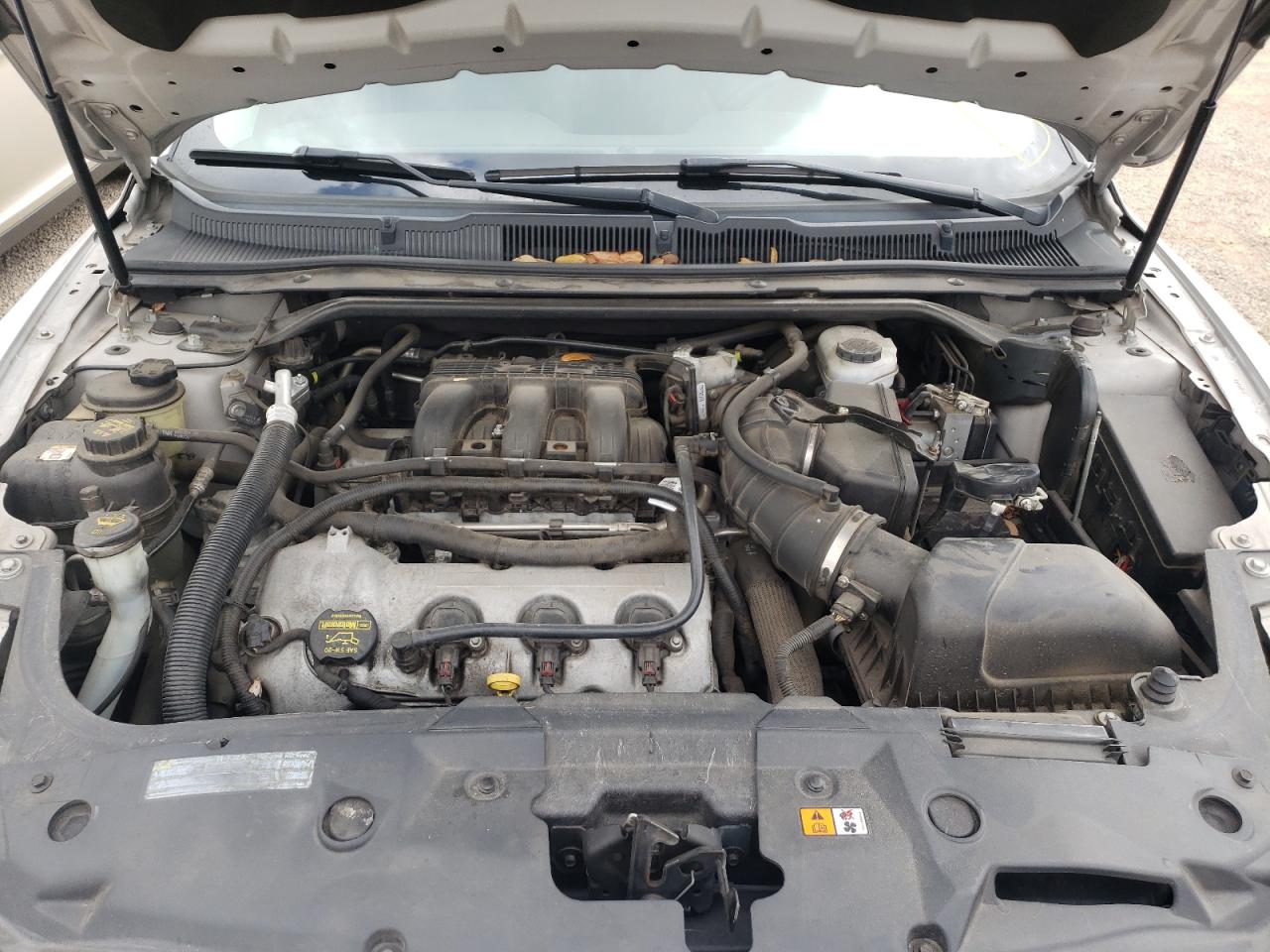 Photo 7 from auction – 2010 FORD TAURUS LIM with VIN 1FAHP2FW8AG153942