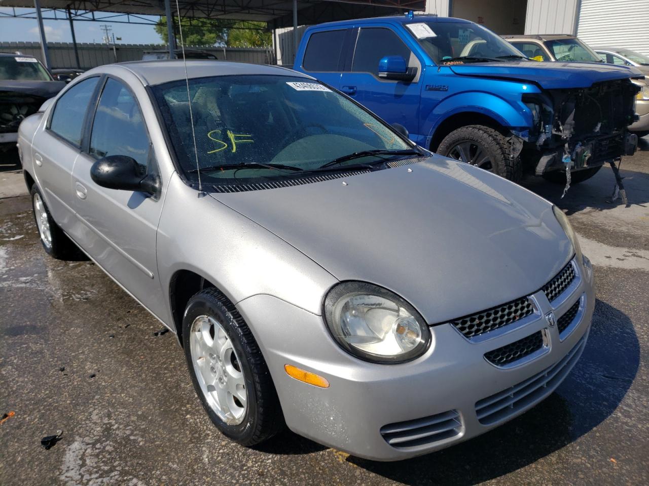 DODGE NEON SXT 2003 with VIN 1B3ES56CX3D106694 - Photo from auction
