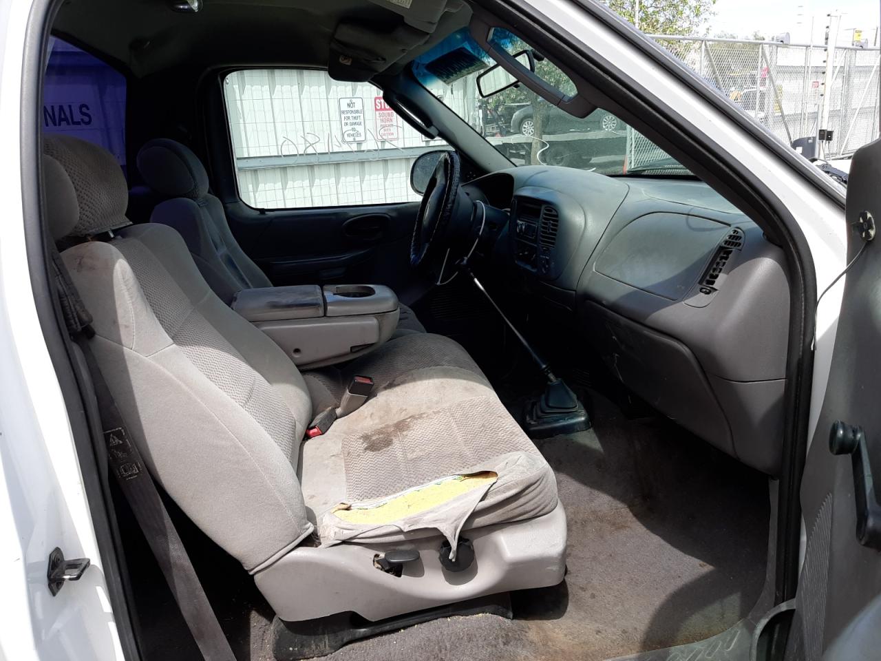 Photo 5 from auction – 2003 FORD F150 with VIN 1FTRF17283NB13107