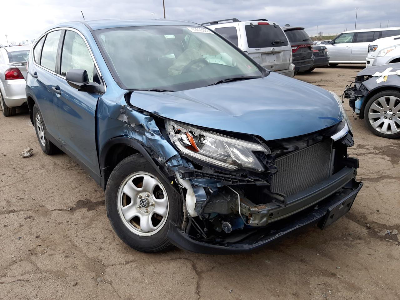 Photo 1 from auction – 2015 HONDA CR-V LX with VIN 5J6RM4H38FL071739