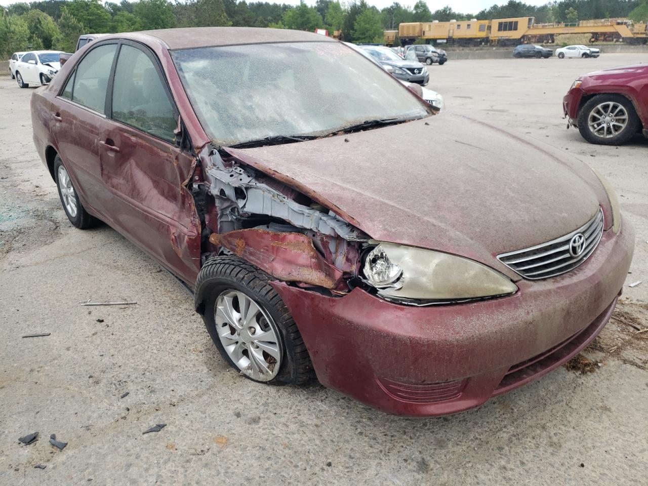TOYOTA CAMRY LE 2005 with VIN 4T1BF32K45U099506 - Photo from auction