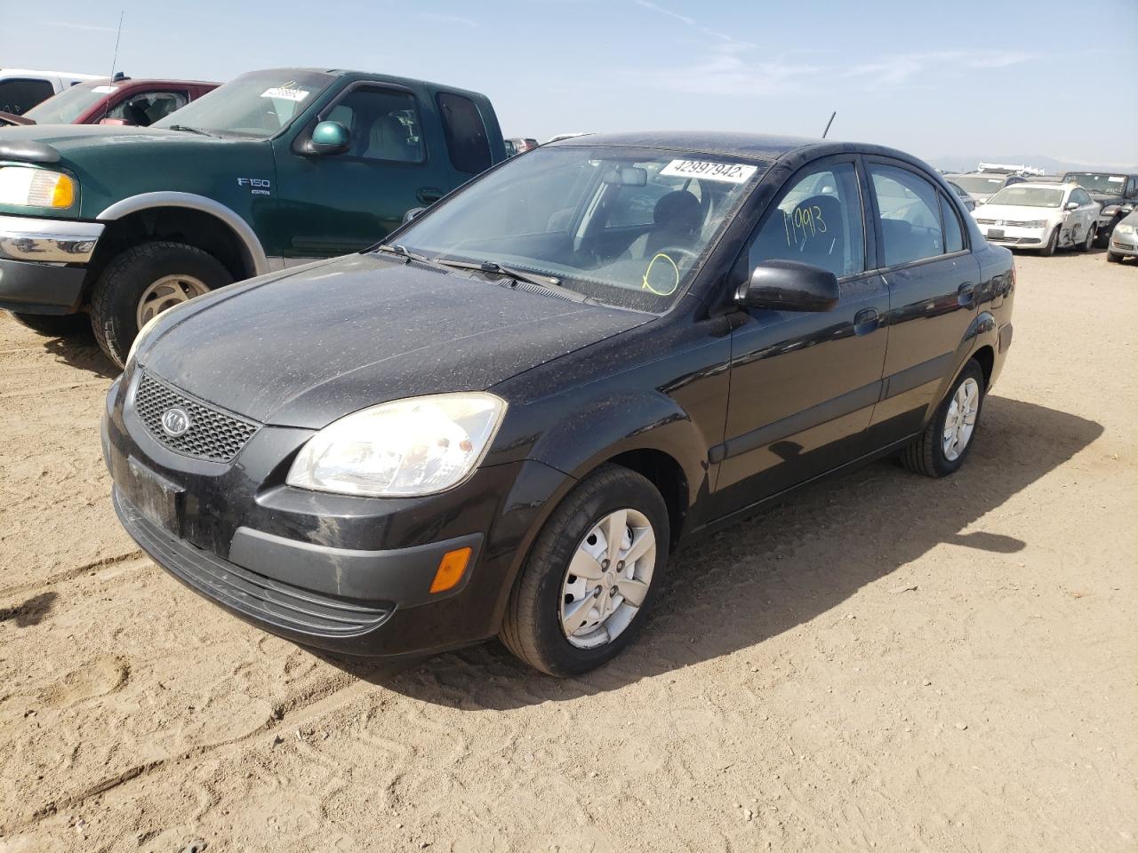 Photo 2 from auction – 2009 KIA RIO BASE with VIN KNADE223396467149