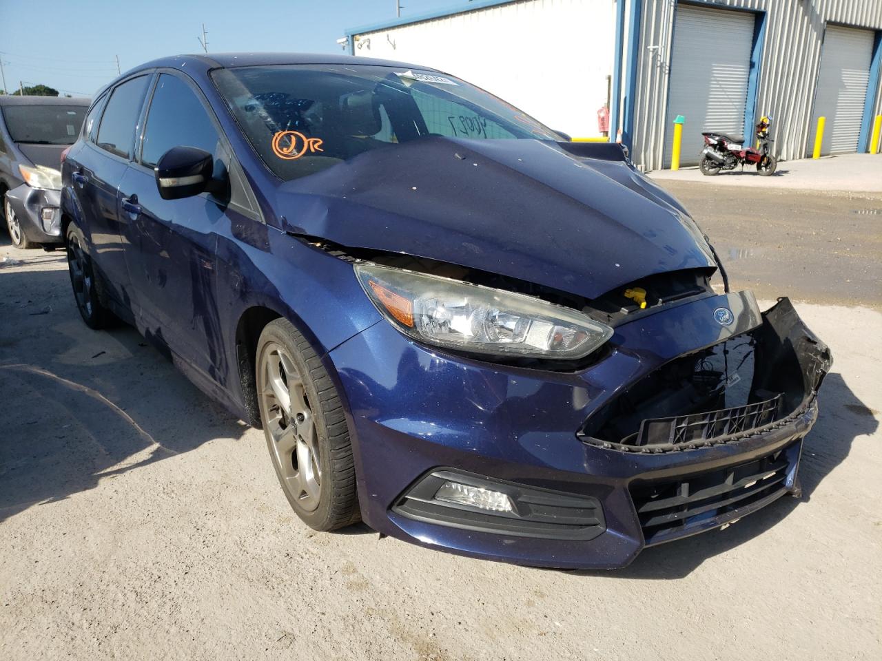 FORD FOCUS ST 2017 with VIN 1FADP3L93HL256593 - Photo from auction