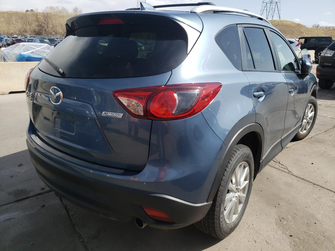 Photo 4 from auction – 2014 MAZDA CX-5 TOURI with VIN JM3KE4CY3E0422913
