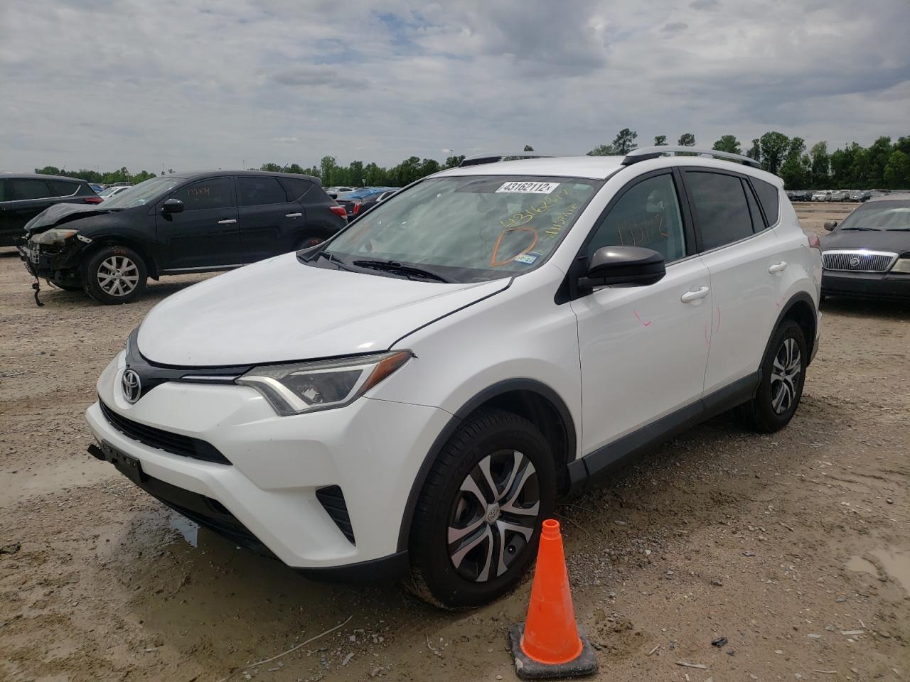 Photo 2 from auction – 2016 TOYOTA RAV4 LE with VIN 2T3ZFREV4GW310852