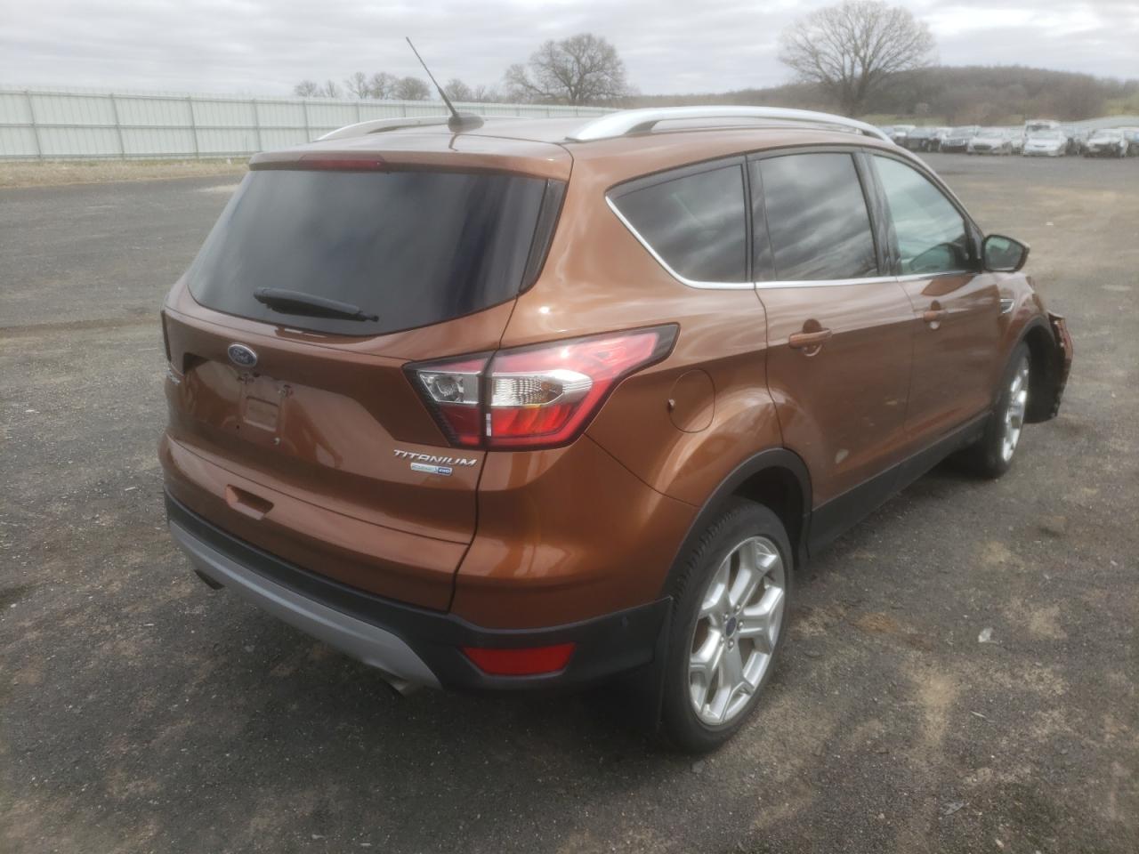 Photo 4 from auction – 2017 FORD ESCAPE TIT with VIN 1FMCU9J92HUB58147
