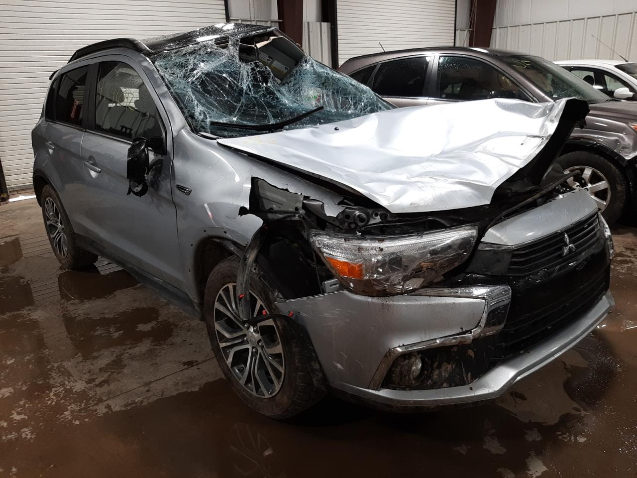 MITSUBISHI OUTLANDER 2016 with VIN JA4AR4AW2GZ055957 - Photo from auction