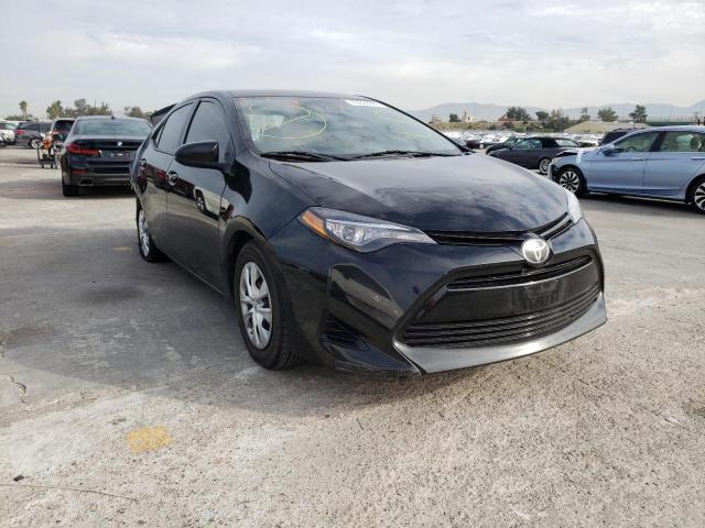 TOYOTA COROLLA L 2017 with VIN 5YFBURHE4HP607702 - Photo from auction