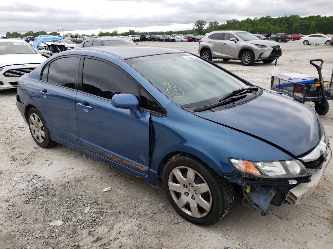 HONDA CIVIC LX 2010 with VIN 2HGFA1F54AH581128 - Photo from auction