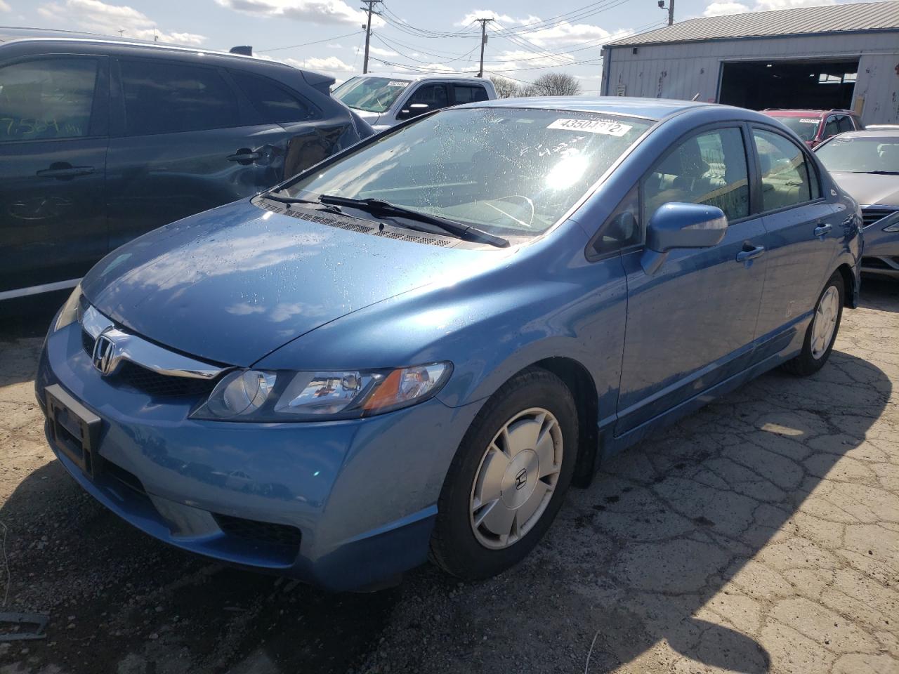Photo 2 from auction – 2009 HONDA CIVIC HYBR with VIN JHMFA36279S015709