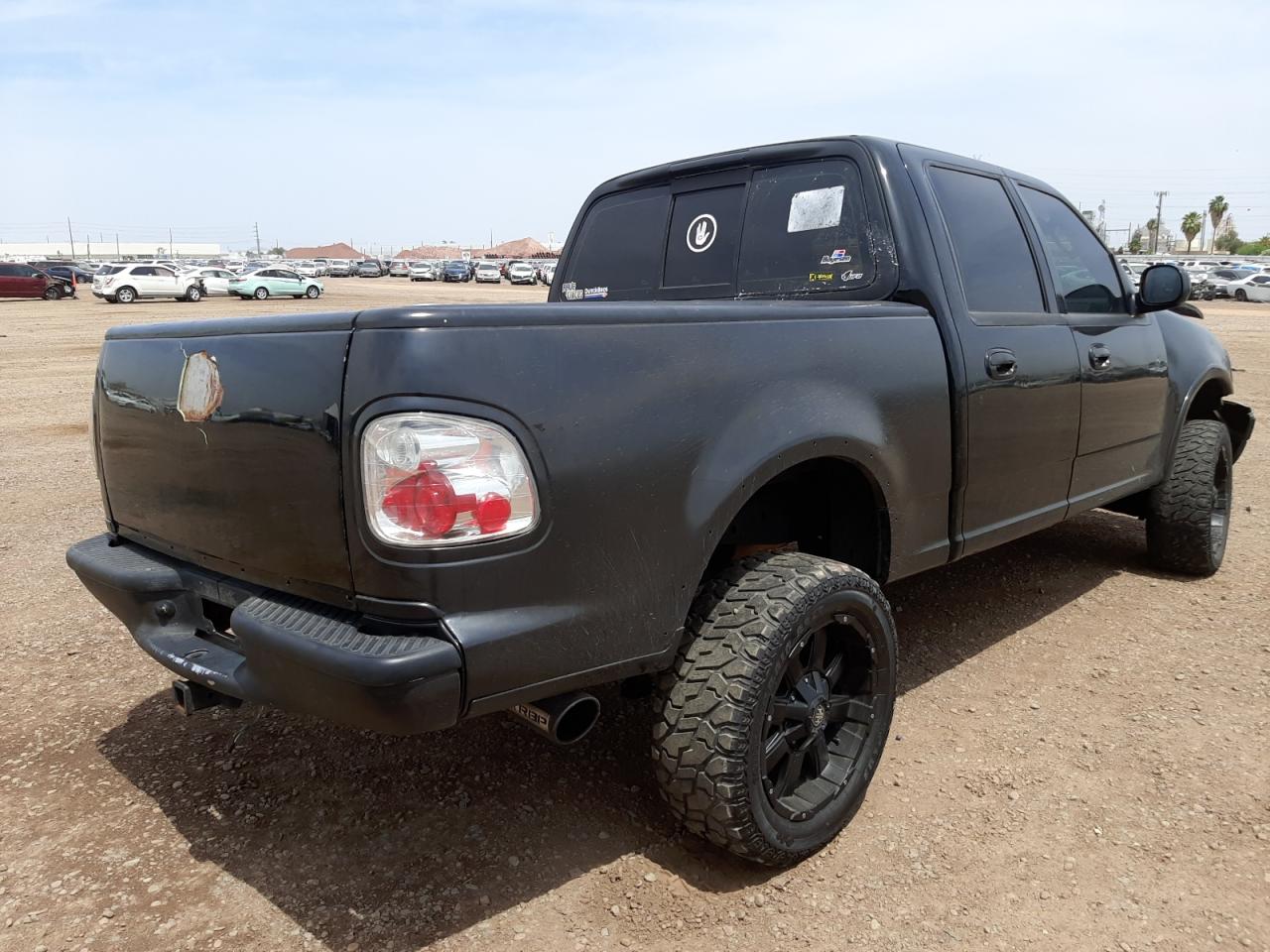 Photo 4 from auction – 2003 FORD F150 SUPER with VIN 1FTRW08L73KA58328