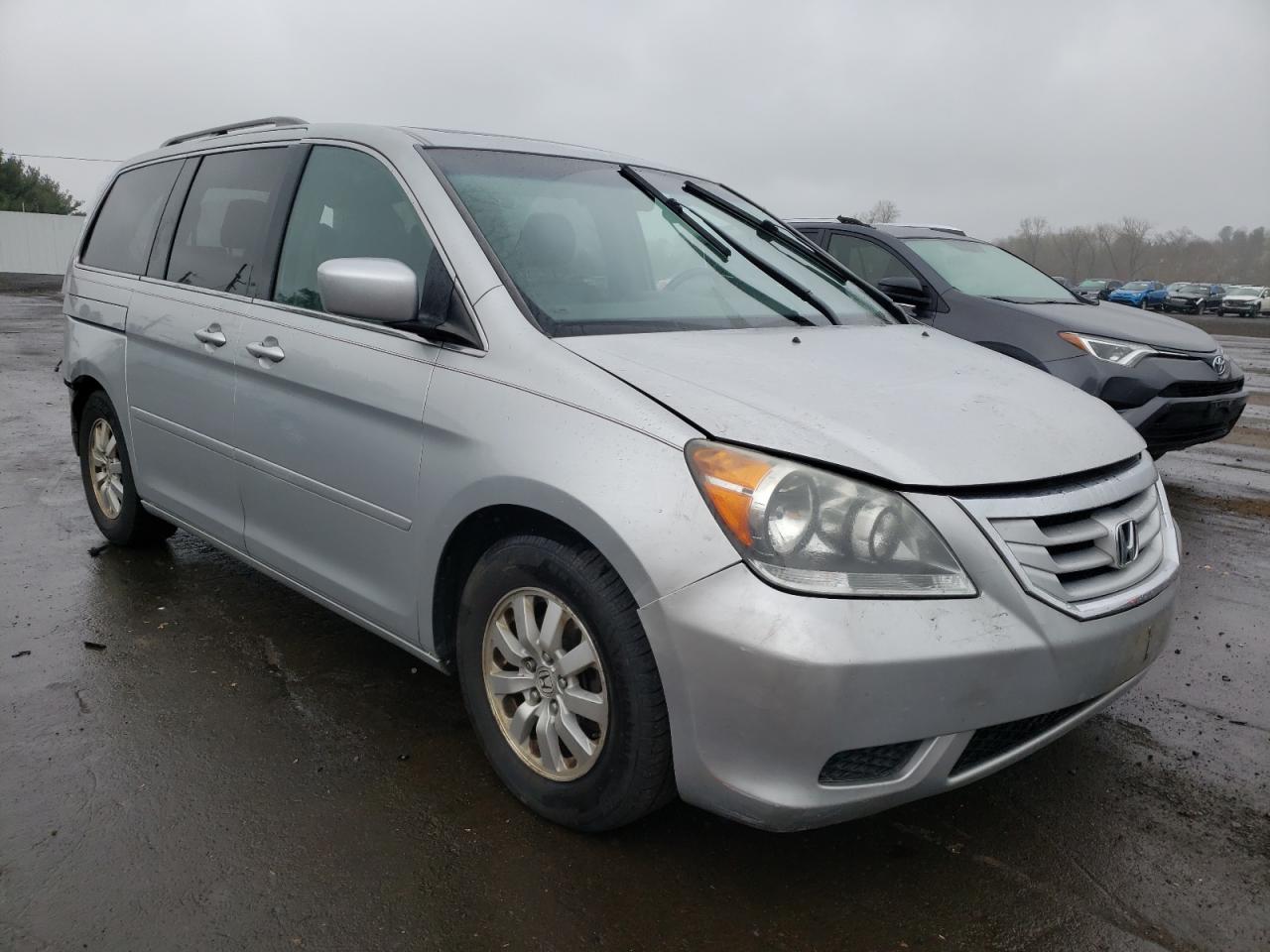 HONDA ODYSSEY EX 2010 with VIN 5FNRL3H73AB024362 - Photo from auction