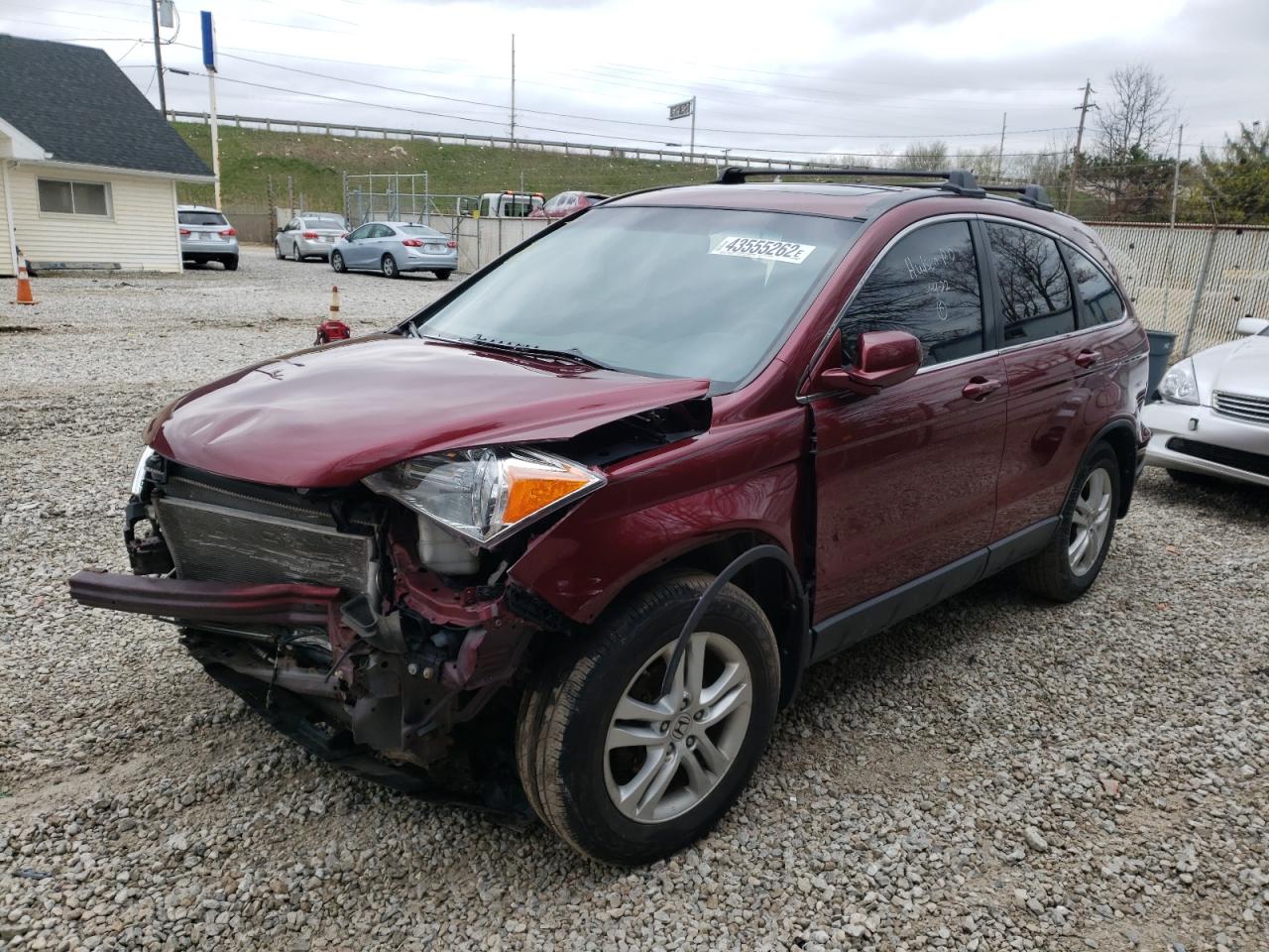 Photo 2 from auction – 2010 HONDA CR-V with VIN JHLRE4H70AC014906