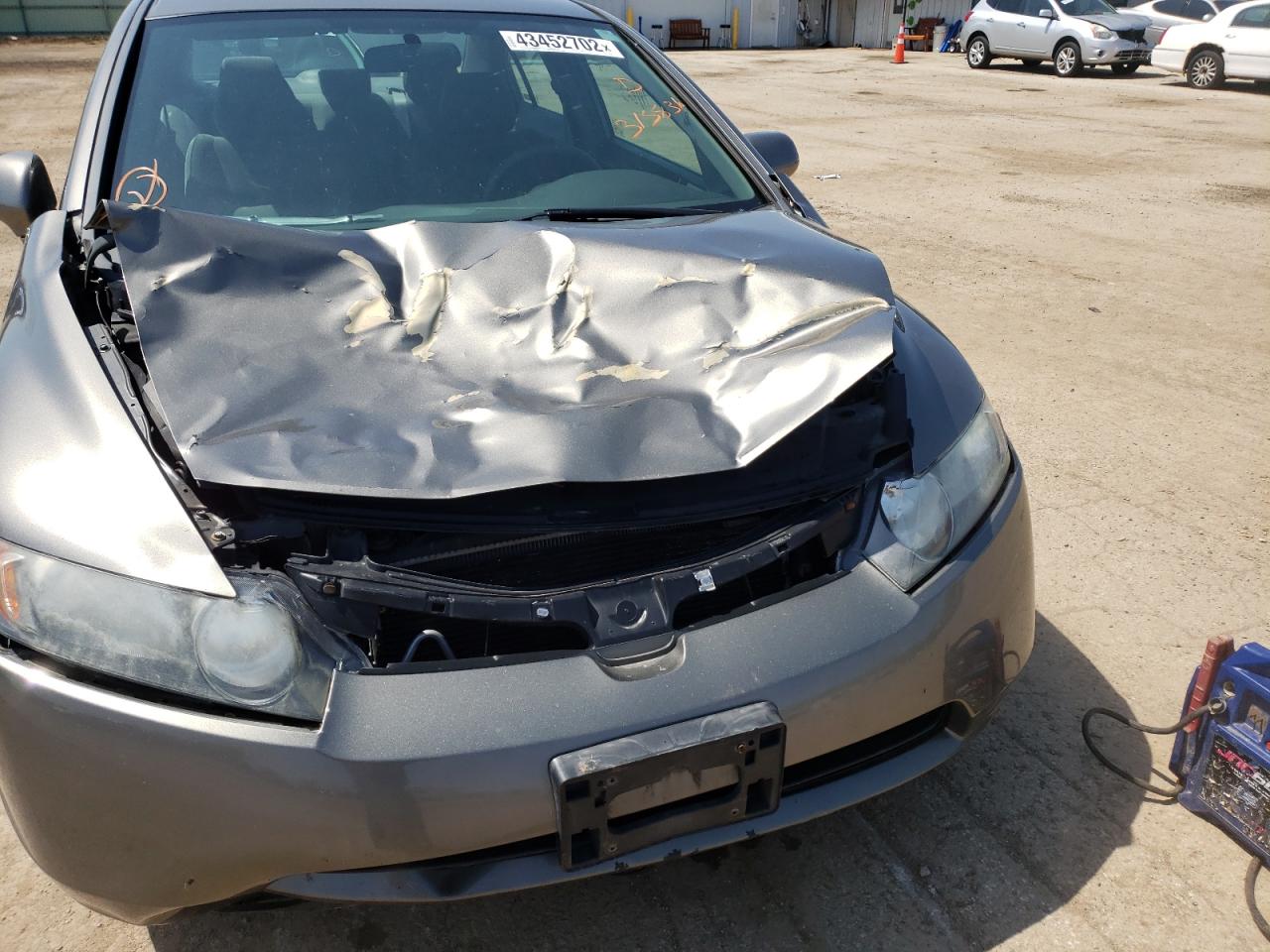 Photo 9 from auction – 2007 HONDA CIVIC LX with VIN 2HGFA16557H315836