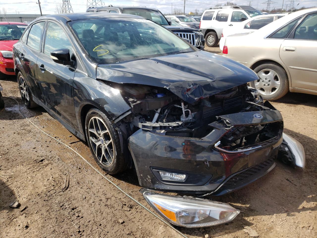 FORD FOCUS SE 2015 with VIN 1FADP3F27FL360841 - Photo from auction