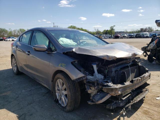 KIA FORTE EX 2014 with VIN KNAFX4A81E5147002 - Photo from auction