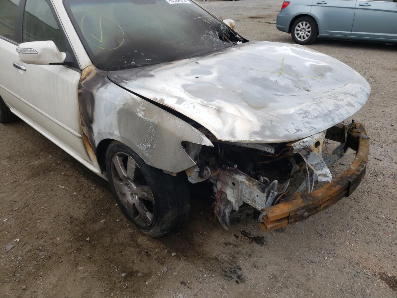 Photo 9 from auction – 2009 KIA OPTIMA LX with VIN KNAGE228395335006